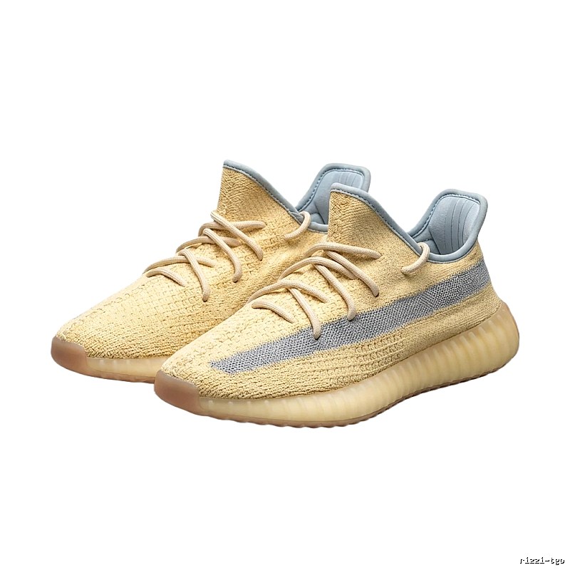 The minimalist style light yellow shoes of Yeezy 350 v2