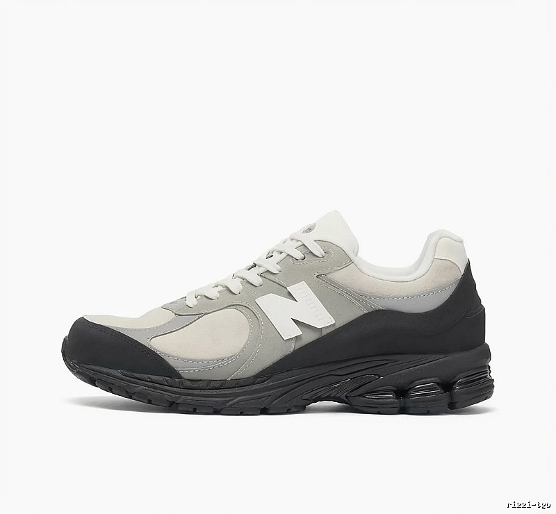Retro-style gray and white sneakers of New Balance